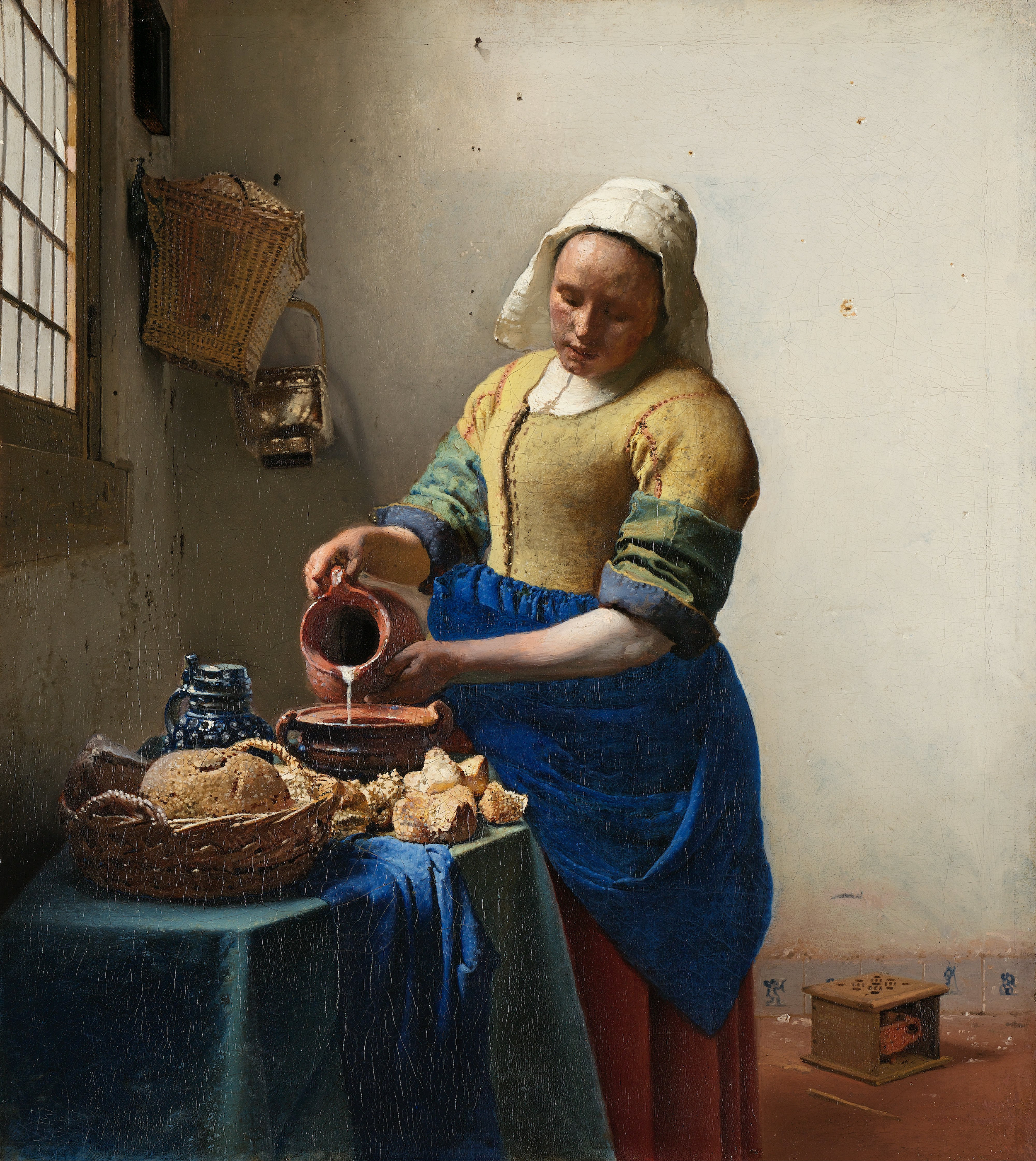 倒牛奶的女仆 by 约翰尼斯· 弗美尔 - 1657–1658 - 45.5 × 41 cm 