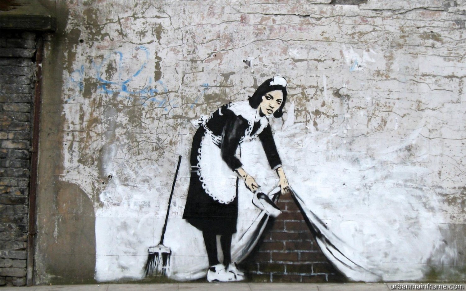 Sweep it under the carpet by  Banksy - 2006/2007 - - Chalk Farm Road