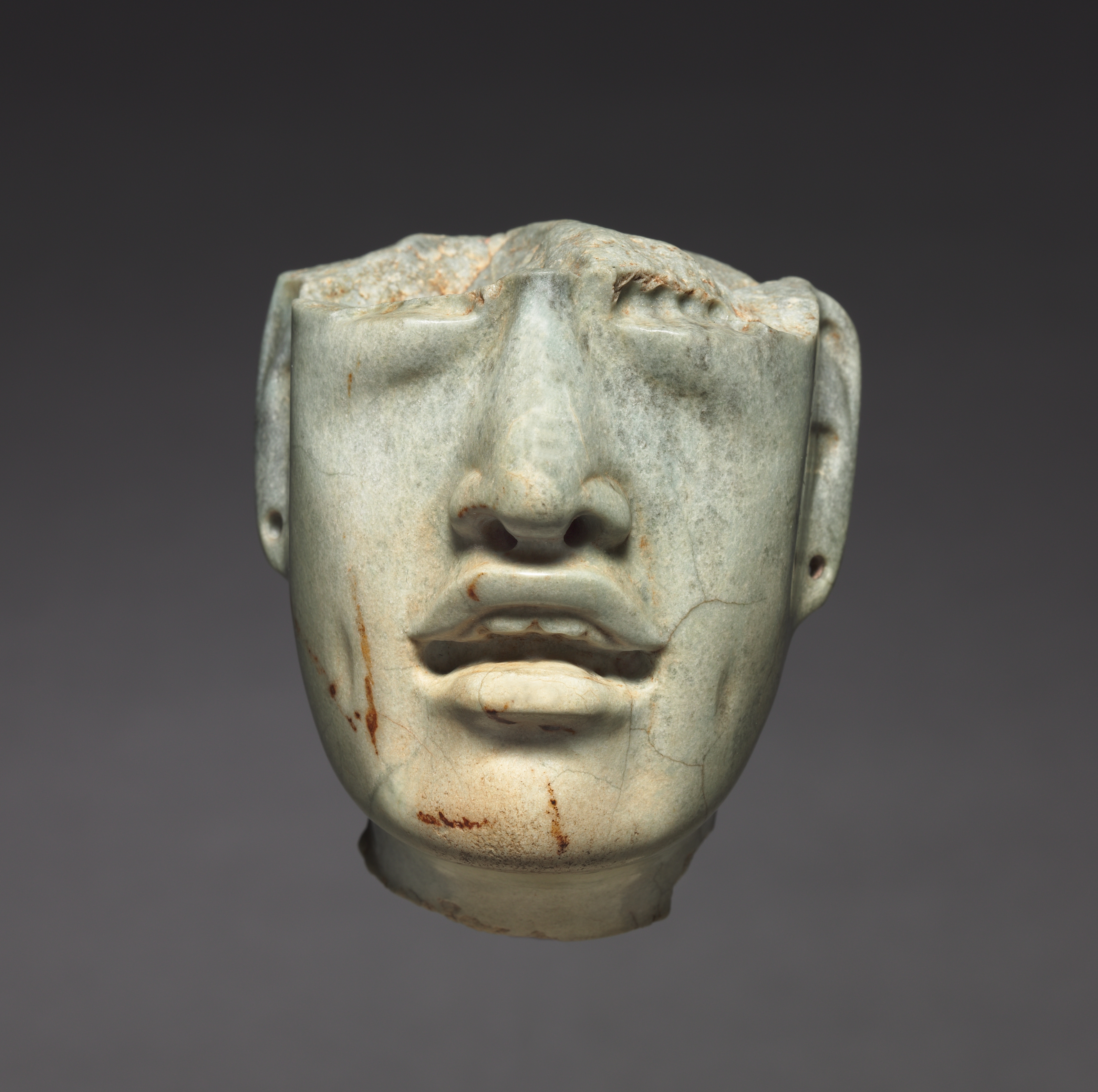 Head Fragment by Unknown Artist - c. 900-300 BC - 7.4 x 6.2 x 5 cm Cleveland Museum of Art