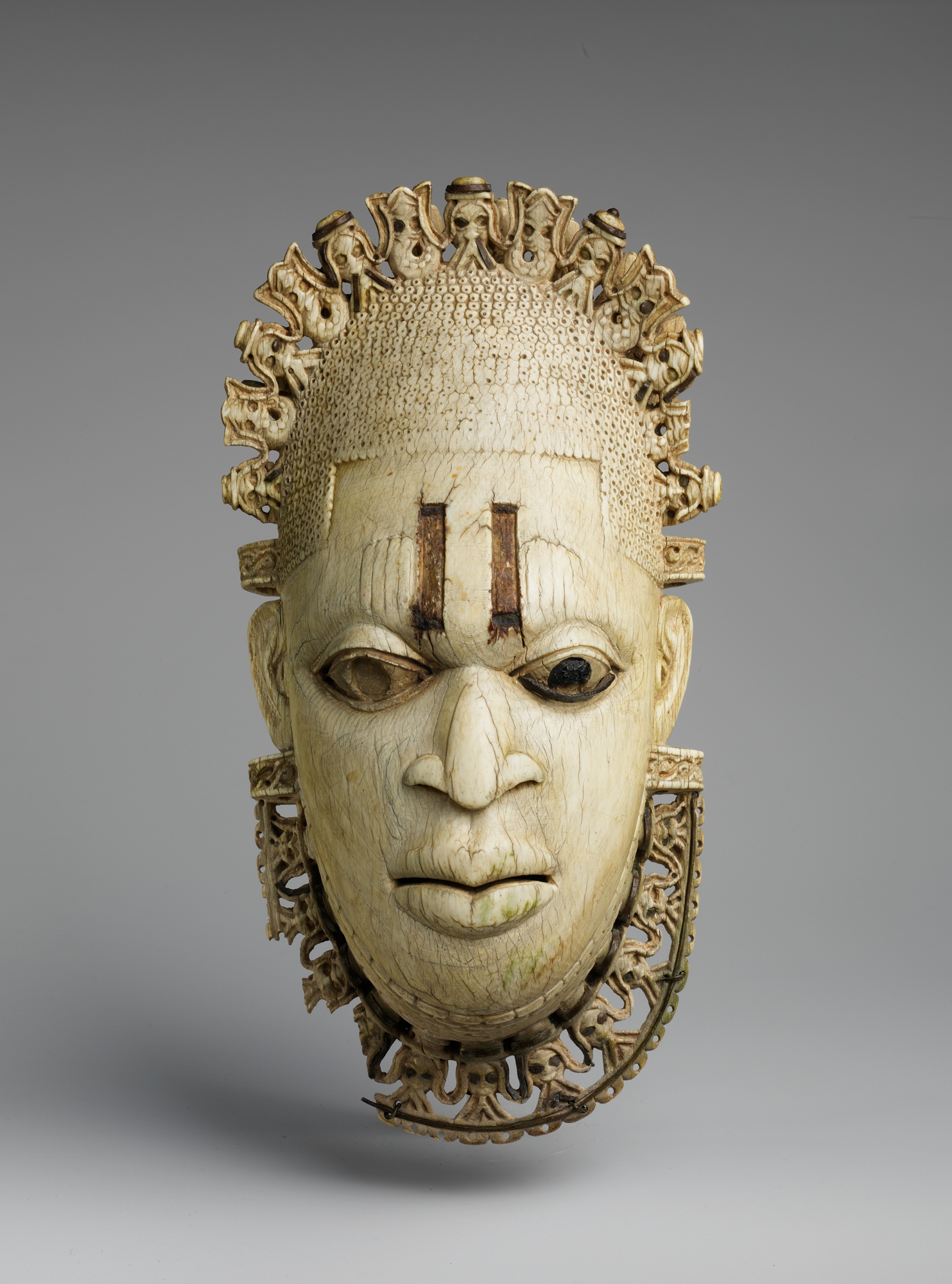 Queen Mother Pendant Mask: Iyoba by Unknown Artist - 16th century - 23.8 x 12.7 x 6.4 cm Metropolitan Museum of Art